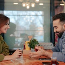 Bustling community with plenty of dining choices a couple dining together