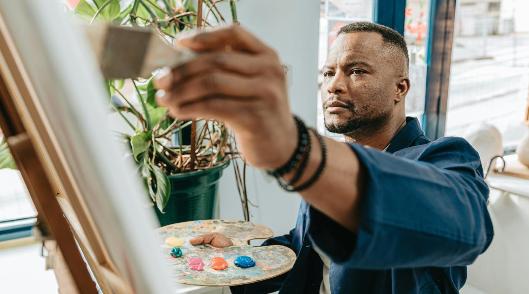 State-of-the-art amenities a man painting on a canvas