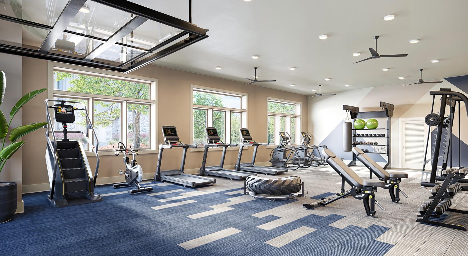 Quick access to state-of-the-art amenities a gym with exercise equipment